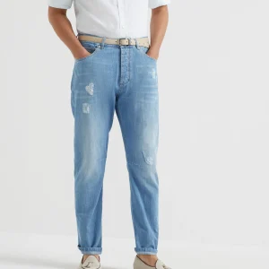 Denim trousers with rips