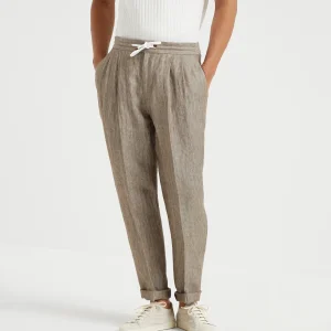 Trousers with double pleats and drawstring